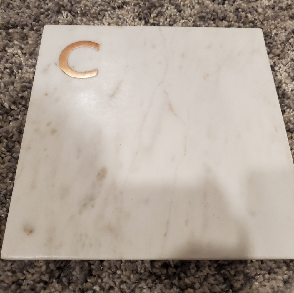 Cheese plate with "C" monogram.